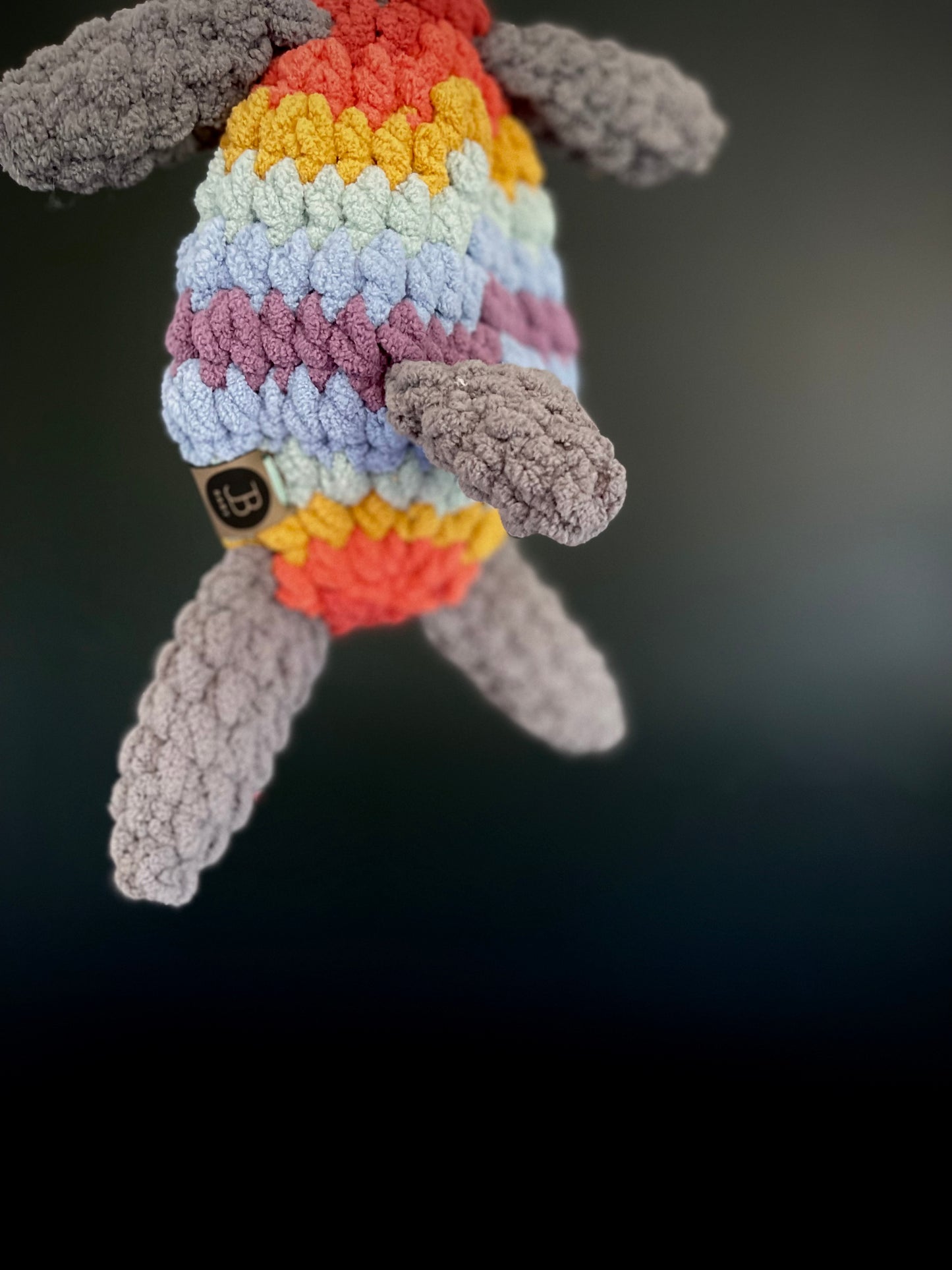 Fiesta Llama Snuggler - Dark Grey & Muted Rainbow